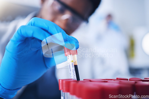 Image of Science, blood and hands with test tube in laboratory for research, medical exam and sample analysis. Healthcare, pharmaceutical and black man scientist with vial for dna experiment, rna and genetics