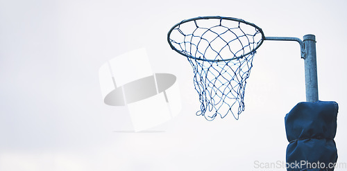 Image of Sports, basketball and netball hoop in a park for fitness and a game at school or in public. Mockup, space and equipment for a sport in the air for playing, competition and professional match