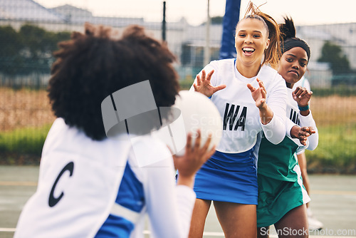 Image of Netball, sport and women in a match or game being competitive in a competition on a court as teammates. Training, fitness and female athletes happy for high school sports and exercise as a team