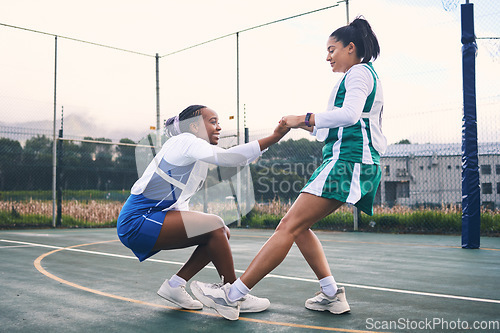 Image of Netball help, support and outdoor game of team sports with fitness and exercise. Helping, sportsmanship and student women with teamwork and collaboration in a sport competition with happiness