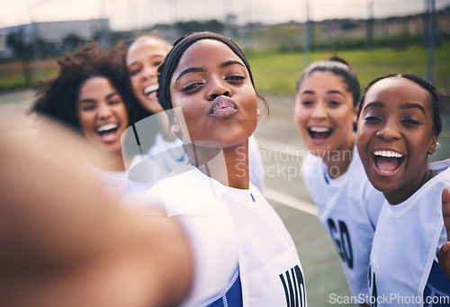 Image of Netball, happy selfie and portrait of girl students on a outdoor sports court for game or workout. Exercise, kiss face and athlete group together for sport, student wellness and teamwork for training