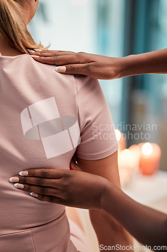 Image of Back, arm and chiropractor with woman for physiotherapy, injury and alignment in consultation room. Physiotherapist, hands and injured girl consulting professional for joint, problem and issue