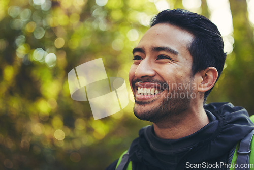 Image of Japanese man, backpacker and hiking in nature forest, trekking woods or trees in adventure, workout or fitness exercise. Smile, happy and environment hiker for travel freedom or healthcare wellness