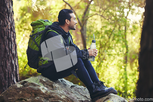 Image of Relax, hiking or water bottle in forest, nature woods or fitness environment for break, electrolytes or healthcare wellness. Hiker man, backpacker or sports drink in rest, recovery or thirsty workout