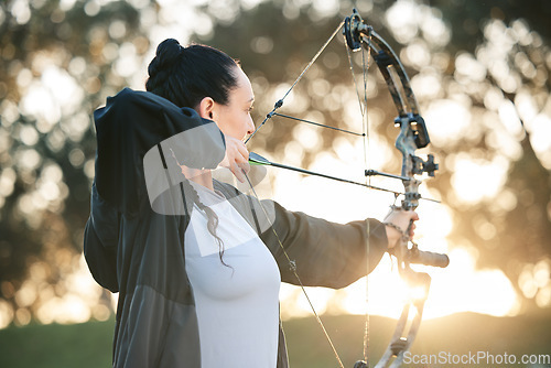 Image of Person, bow or arrows aim in sports field, shooting range or gaming ground for hunting, hobby or performance exercise. Archery, woman or athlete and weapon in target training, competition or practice