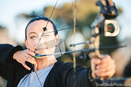 Image of Archery bow, woman aim and shooting range for competition, game or practice at an outdoor sports or park. Hunter or person face with arrow for gaming, adventure and hunting with focus on target