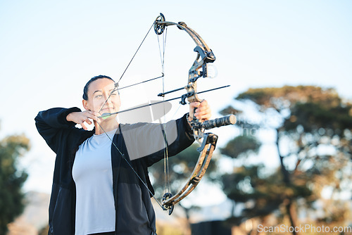 Image of Happy woman, bow or arrows aim in sports field, shooting range or gaming nature in hunting, hobby or exercise. Archery, person or athlete smile with weapon in target training, competition or practice