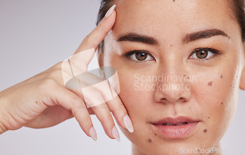 Image of Face portrait, skincare and beauty of woman in studio isolated on a gray background. Makeup, natural cosmetics and young female model with glowing, healthy or flawless skin after spa facial treatment