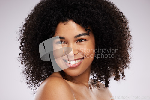 Image of Beauty, skincare and happy black woman isolated on studio background for cosmetics, foundation and natural hair. Young model face or afro person from USA with dermatology facial results or makeup