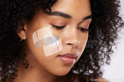 Image of Skincare, cream and face of black woman for beauty, wellness and healthy skin in studio. Dermatology, luxury spa and girl with lotion, creme or moisturizer for makeup, cosmetics and facial treatment