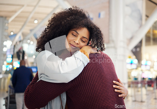 Image of Couple, hug and smile in goodbye at airport for travel, trip or flight in farewell for long distance relationship. Man and woman hugging before traveling, departure or immigration waiting for airline