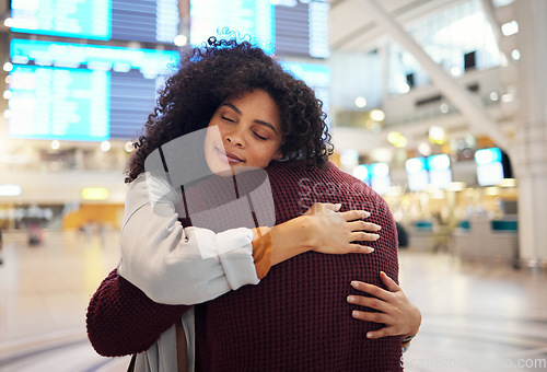 Image of Couple, hug and embracing goodbye at airport for travel, trip or flight in farewell for long distance relationship. Man and woman hugging before traveling, departure or immigration and arrival