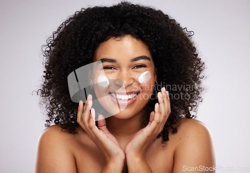 Image of Beauty, cream and portrait of happy black woman for skincare, wellness and healthy skin in studio. Dermatology, luxury spa and girl with face moisturizer for makeup, cosmetics and facial treatment