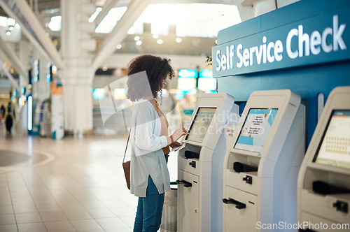 Image of Black woman, airport and self service kiosk for check in, ticket registration or online boarding pass. African female traveler by terminal machine for travel application, document or booking flight