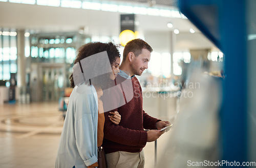 Image of Payment, airport and couple with ticket for self service, checkout or online booking on machine. Paying, man and woman happy, hug and bonding while at POS for flight schedule, travel and information