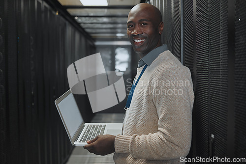 Image of Server room, laptop and man portrait or technician for data center, system and cybersecurity code. Happy African programmer or programming person in information technology, ethernet or power solution