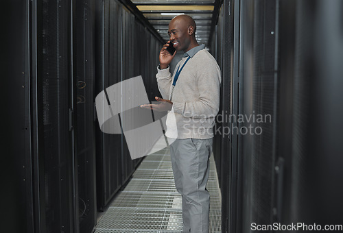 Image of Server room, phone call and man for system update, technician power or cyber security backup communication. Person, african engineering or programmer in information technology talking on smartphone