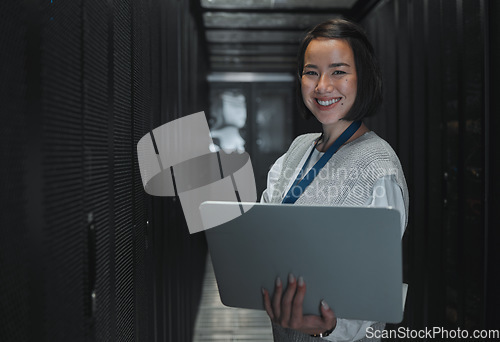 Image of Woman with laptop, server room and information technology, smile in portrait with engineer and datacenter Software update, cybersecurity and network with Asian female setting up firewall and database