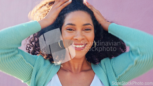 Image of Afro woman with natural hair and happy with growth on pink wall background in summer sunshine. Freedom, carefree and empowerment girl with retro curly hairstyle for outdoor hair care or beauty mockup