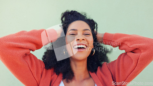 Image of Hands of happy woman play with hair, beauty and smile from Portugal girl feeling freedom, excited and wellness. Happiness, high energy and gen z person with healthy, natural and good curly hair care