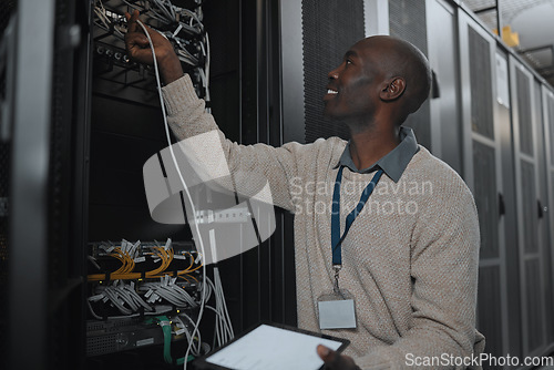 Image of Engineer, server room and black man with cable and tablet for database maintenance or software update. Cybersecurity, it or startup male coder on tech for programming or networking in data center