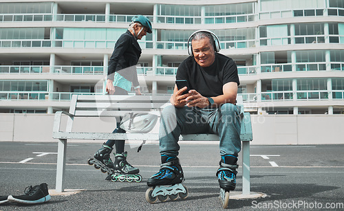 Image of Roller skate, music and senior couple with phone in city for sports, adventure and fitness hobby outdoors. Retirement, holiday and elderly man and woman ready for skating, relaxing and journey