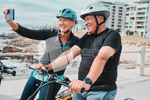 Image of Cycling, smile and fitness with old couple and selfie for social media, workout and health training. Wellness, internet and blog with senior man and woman on bike for sports, exercise and travel