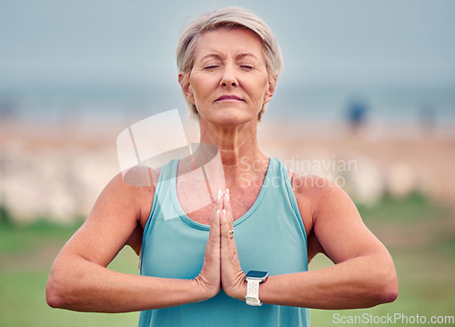 Image of Yoga meditation, mature woman and outdoor fitness for pilates wellness, mental health and chakra energy exercise. Lady meditate in nature to relax for peace, healing mindset and zen namaste in nature
