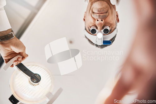 Image of Eye exam, flashlight and face of optometrist looking down to patient for vision test, eyesight and optical exam Ophthalmology, clinic and man in consultation for retina, eyes and medical surgery