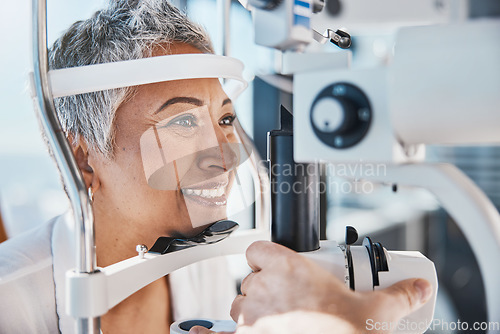 Image of Face, eye exam or happy woman in test or consulting doctor for eyesight assessment at optometrist office. Senior customer testing vision with optician helping or checking iris or retina visual health