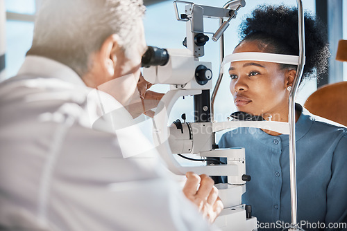 Image of Help, eye exam or black woman consulting doctor for eyesight at optometrist or ophthalmologist. African customer testing vision with mature optician checking iris, glaucoma or retina visual health