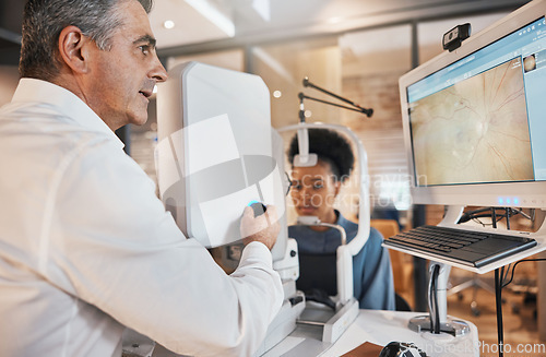 Image of Computer, eye exam or black woman consulting doctor to help with eyesight at optometrist or ophthalmologist. African customer testing vision with mature optician to check iris or retina visual health