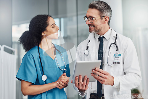 Image of Tablet, collaboration and team of doctors in a hospital analyzing results or diagnosis of patient. Teamwork, medical and healthcare workers in discussion and research on mobile device in a clinic.