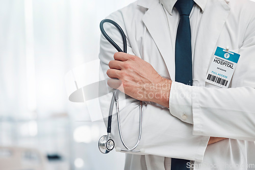 Image of Doctor, hands and arms crossed with stethoscope for healthcare cardiology or life insurance at hospital. Hand of confident medical expert or professional specialist standing ready at clinic on mockup