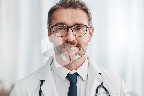 Image of Healthcare, leadership and portrait of mature doctor, man in hospital for support, pride and help in medical work. Health, wellness and medicine, confident professional with stethoscope and smile.