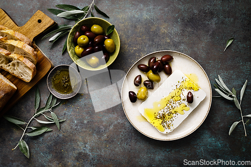 Image of Feta cheese, olives and ciabatta, top view