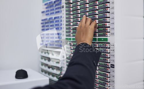 Image of Optician, hand and vision box storage in retail store, clinic or medical center for prescription lens, contacts or eyewear help. Zoom, woman and eyes optometrist checking stock, shelf or shop order