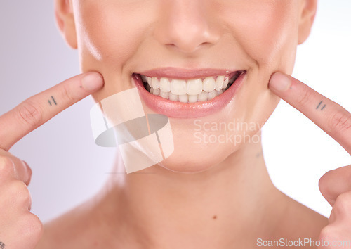 Image of Mouth, dental and oral hygiene with a model woman in studio on a gray background for teeth whitening. Dentist, healthcare and veneers with a female indoor to show a happy smile at a tooth specialist
