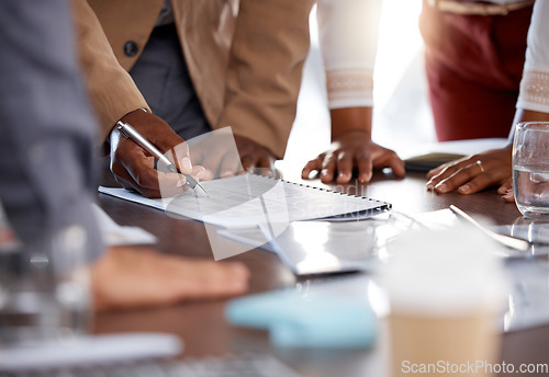 Image of Hands, documents and meeting with a business man signing a contract in the office during a negotation. Accounting, collaboration or finance with a manager and employee group reading a checklist