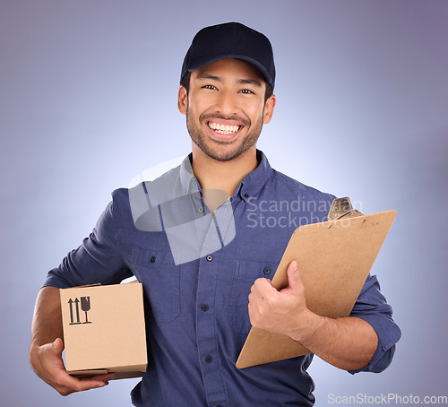 Image of Delivery man, box and portrait isolated on studio background with courier services and clipboard and smile. Asian worker, supplier or logistics person package for Korea distribution and product sales