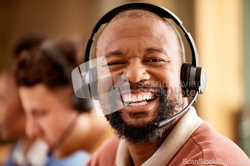 Image of Face, portrait and smile of black man in call center for customer service work in office. Crm consulting, sales agent and happy telemarketer, representative or male consultant laughing at funny joke.