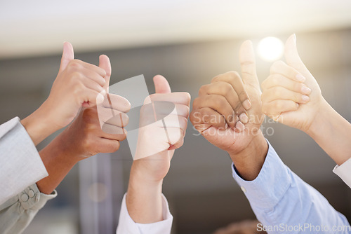 Image of Hands, thumbs up and motivation with a business team in celebration of a goal, target or deal at work. Thank you, winner and collaboration with a group of people celebrating success in the office