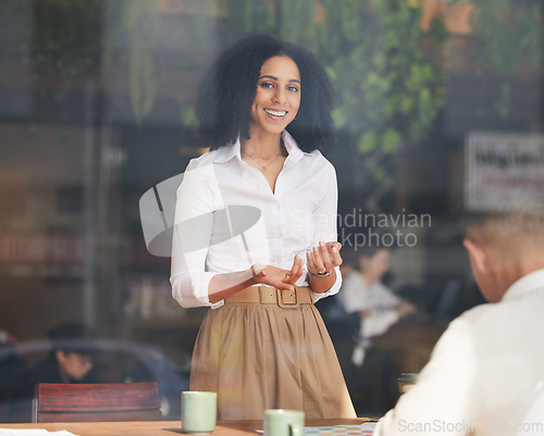 Image of Portrait, meeting and presentation with a business black woman talking to her team through an office window. Training, coaching and agenda with a female employee talking to an employee group at work