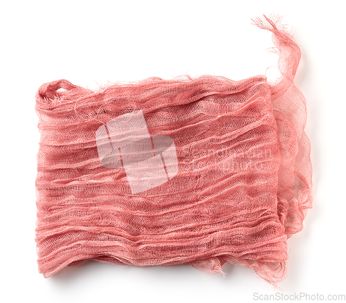 Image of pink folded crumpled cotton napkin
