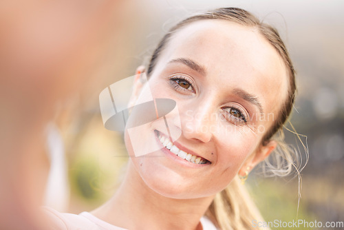 Image of Portrait, selfie and woman in nature for wellness, relax or training, happy and smile on blurred background. Face, girl and runner pose for profile picture, photo or social media update after workout