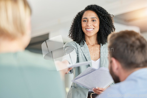Image of Black woman, leader with business team in meeting, paperwork and presentation with collaboration. Diversity, people and project proposal with speaker, smile with market research in conference room
