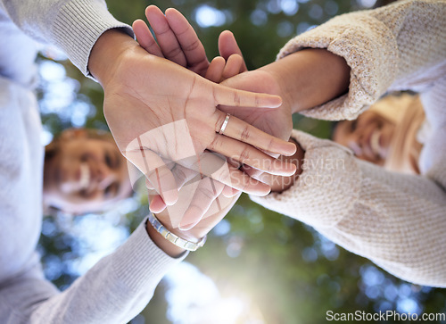 Image of Support, solidarity and hands of people in nature for teamwork, community and motivation. Goal, excited and low view of friends with a gesture for success, collaboration and unity in a park or garden