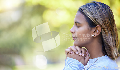 Image of Prayer, peace and worship with woman in nature and mockup for God, spirituality and religion faith. Relax, calm and reflection with girl praying in park for health, wellness and meditation belief