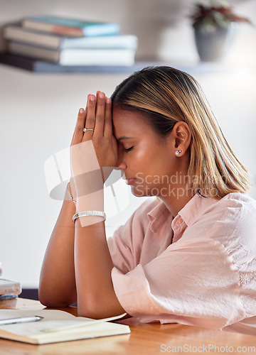 Image of Black woman, praying hands and books for religion, faith and god help, holy support and spiritual guidance in study. Prayer, hope and christian person or sad university student with bible education