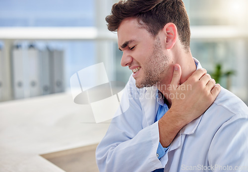 Image of Tired man doctor with neck pain in office overworked, burnout or stress for healthcare or hospital depression. Medical professional worker, frustrated person or angry nurse for muscle injury at desk